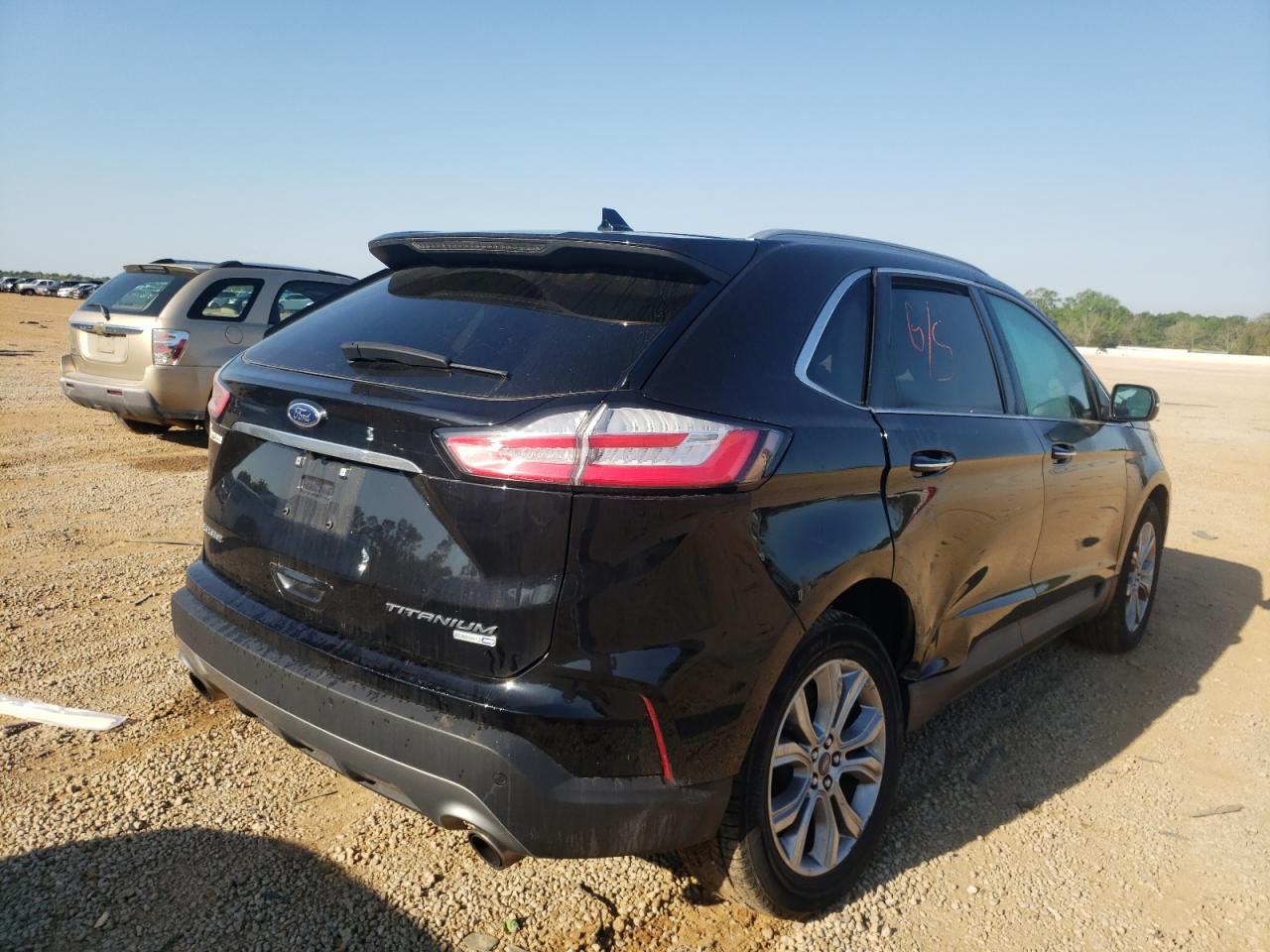 Photo 4 from auction – 2019 FORD EDGE TITAN with VIN 2FMPK4K91KBB54192