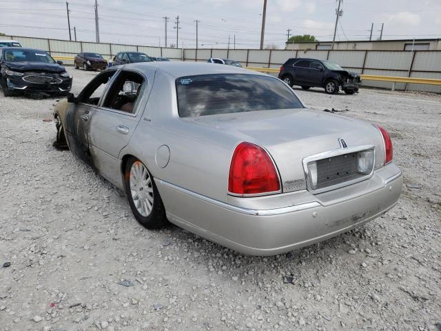 Photo 3 from auction – 2004 LINCOLN TOWN CAR E with VIN 1LNHM81W04Y623744