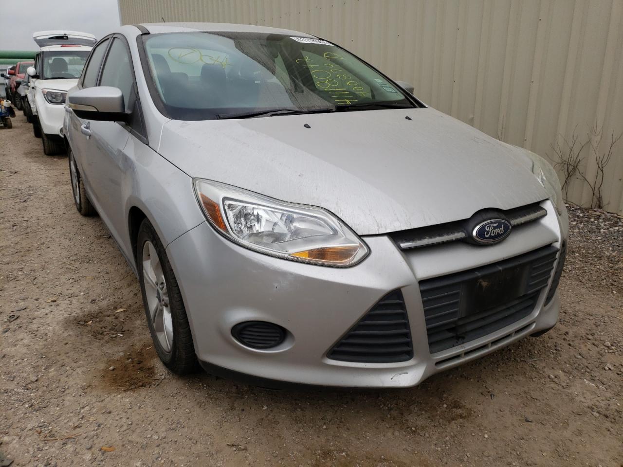 FORD FOCUS SE 2014 with VIN 1FADP3F21EL400894 - Photo from auction