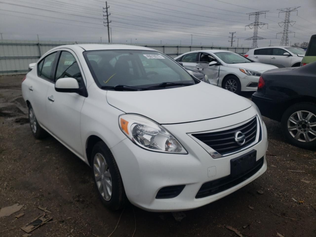 NISSAN VERSA S 2014 with VIN 3N1CN7APXEL834938 - Photo from auction