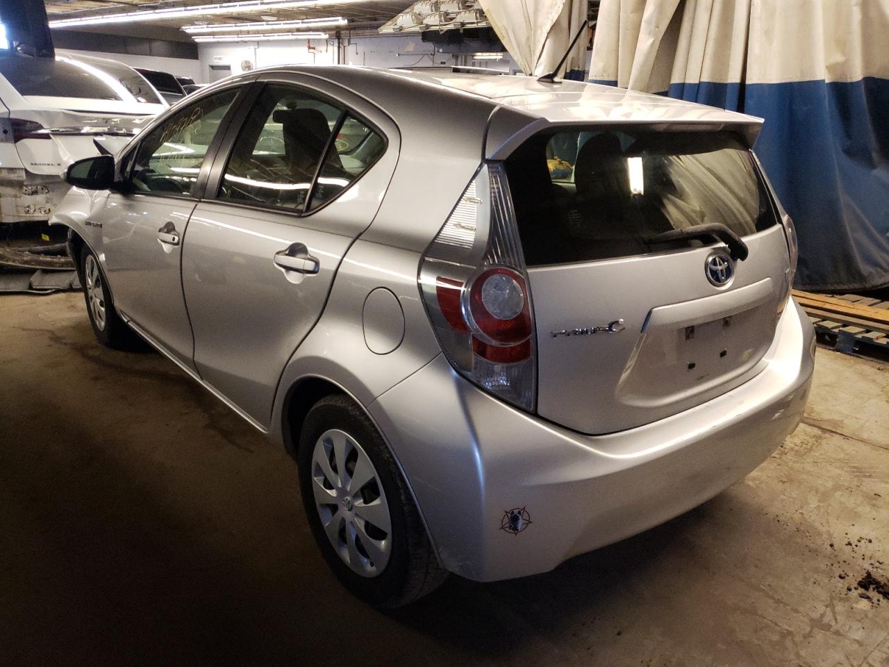 Photo 3 from auction – 2014 TOYOTA PRIUS C with VIN JTDKDTB36E1561648
