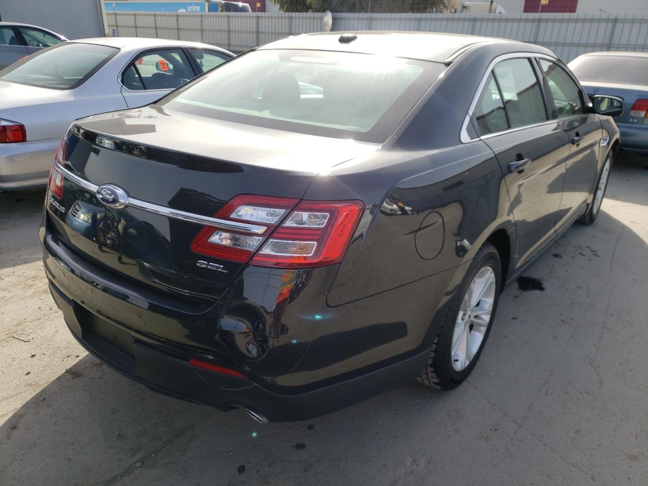 Photo 4 from auction – 2015 FORD TAURUS SEL with VIN 1FAHP2E82FG140761