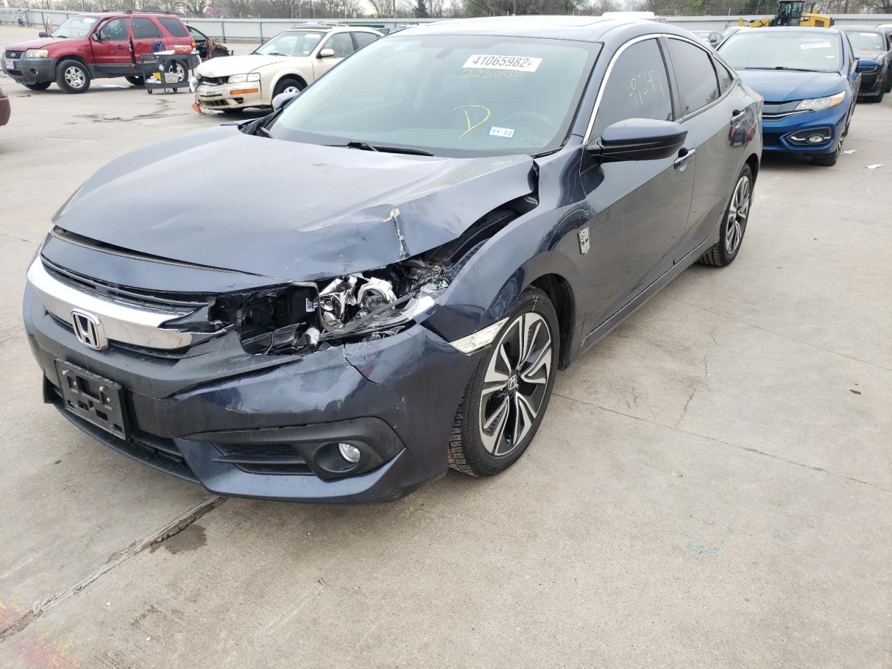 Photo 2 from auction – 2016 HONDA CIVIC EXL with VIN 19XFC1F79GE223005