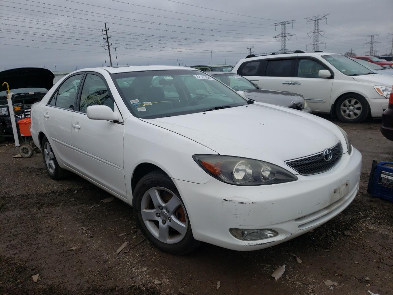 TOYOTA CAMRY LE 2003 with VIN 4T1BF30K83U038904 - Photo from auction