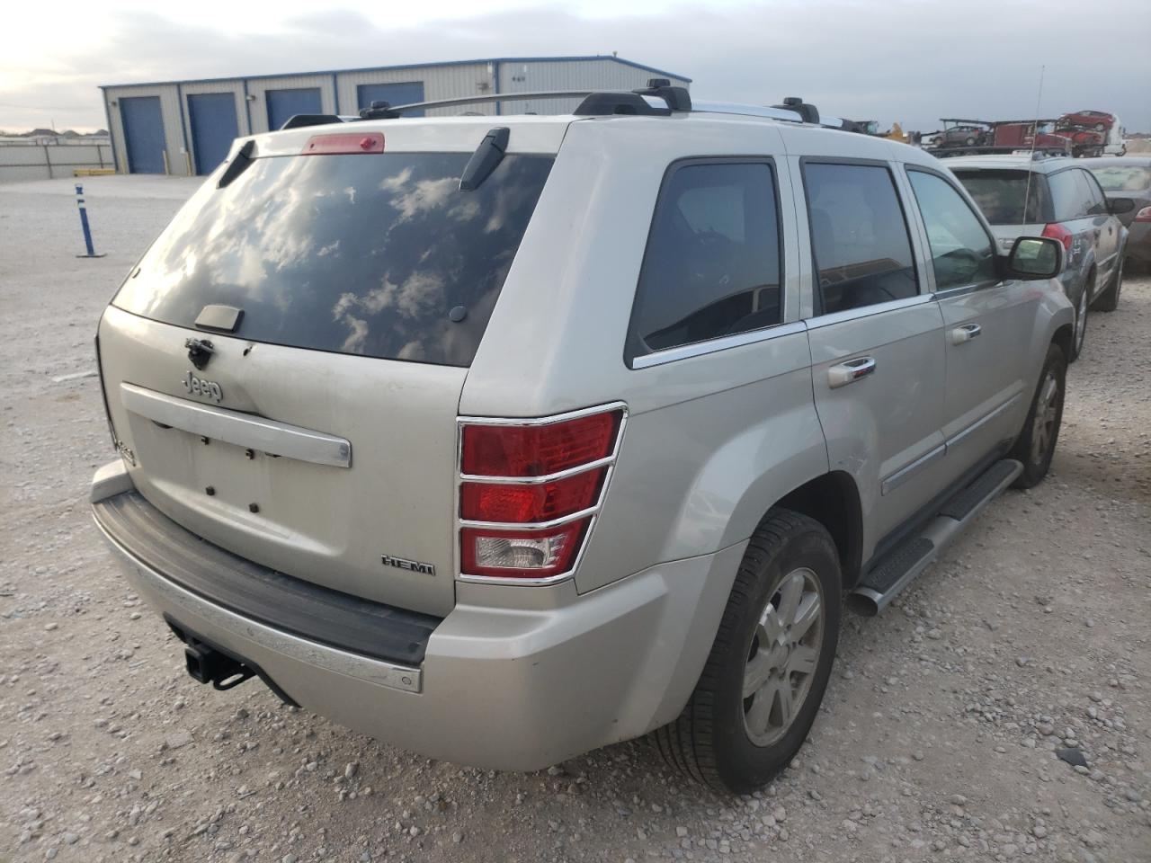Photo 4 from auction – 2010 JEEP GRAND CHER with VIN 1J4RR5GT7AC129292