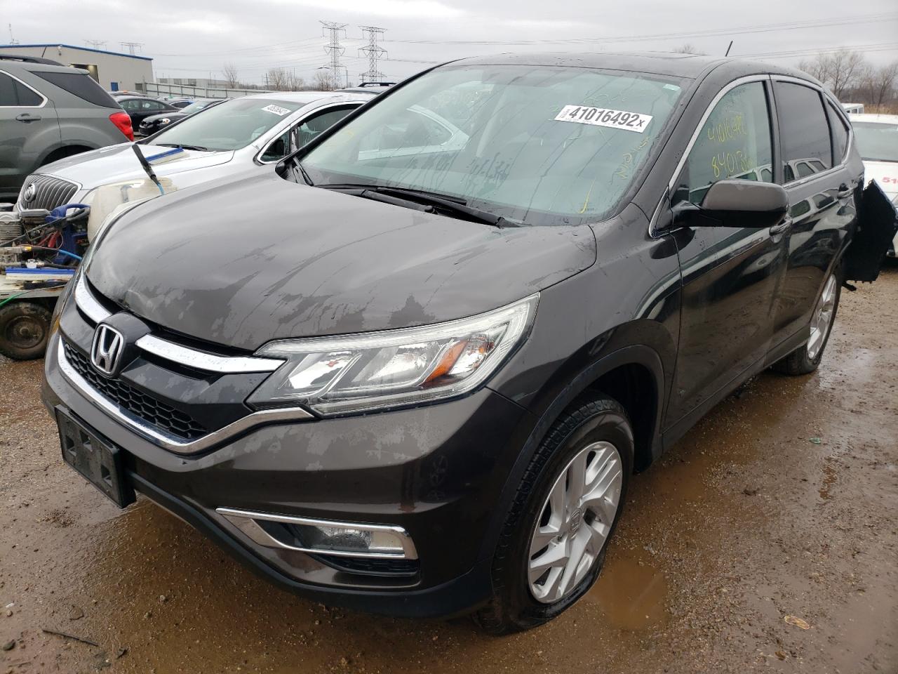Photo 2 from auction – 2015 HONDA CR-V EX with VIN 2HKRM4H58FH656364