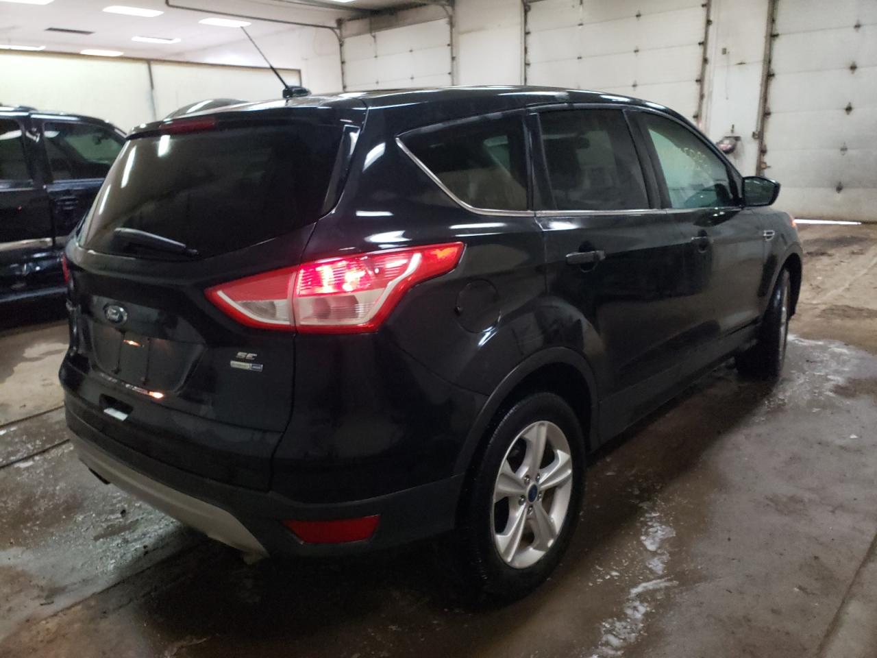 Photo 4 from auction – 2014 FORD ESCAPE SE with VIN 1FMCU9G92EUA85400