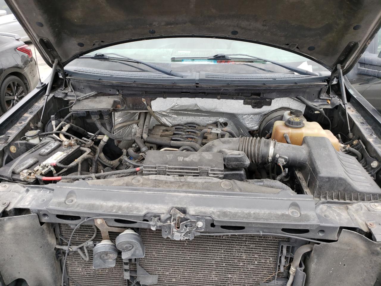 Photo 7 from auction – 2011 FORD F150 with VIN 1FTNF1CF7BKD56589