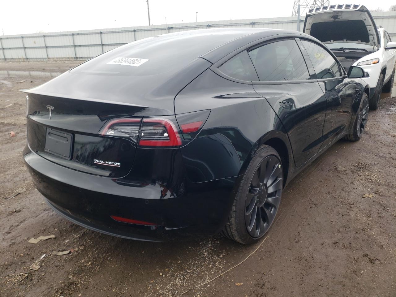 Photo 4 from auction – 2022 TESLA MODEL 3 with VIN 5YJ3E1EC1NF181450