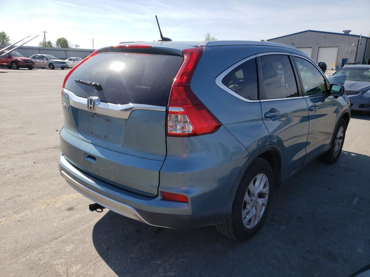 Photo 4 from auction – 2016 HONDA CR-V EXL with VIN 2HKRM3H79GH505370