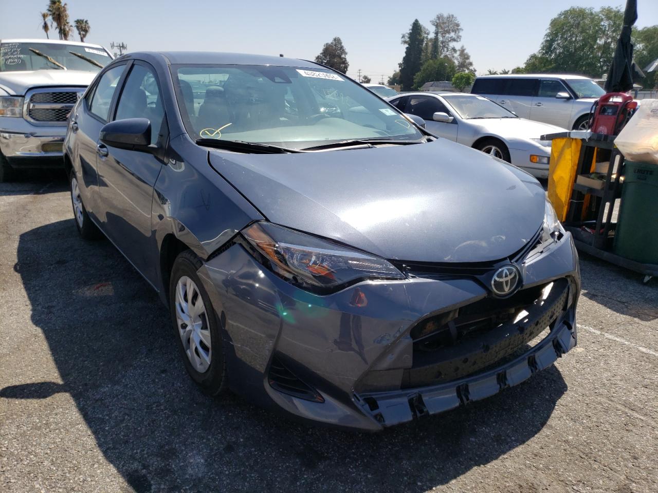 TOYOTA COROLLA L 2017 with VIN 5YFBURHEXHP696384 - Photo from auction
