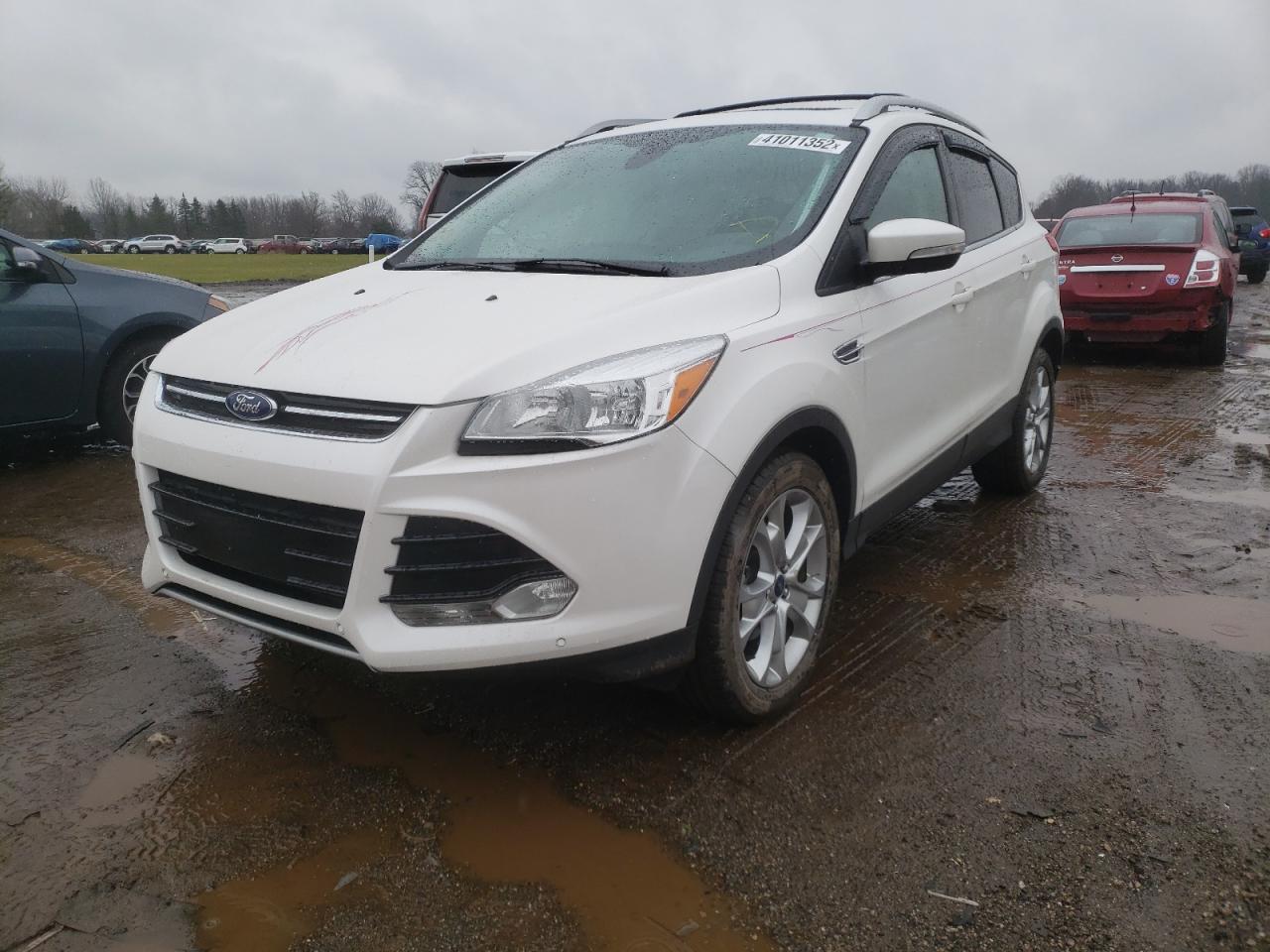 Photo 2 from auction – 2014 FORD ESCAPE TIT with VIN 1FMCU0JX2EUE49124