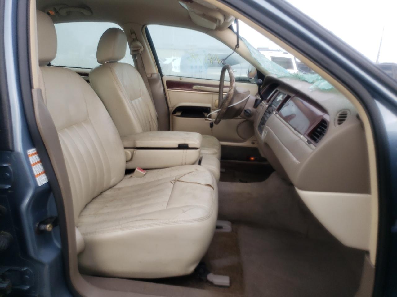Photo 5 from auction – 2004 LINCOLN TOWN CAR E with VIN 1LNHM81W64Y625868