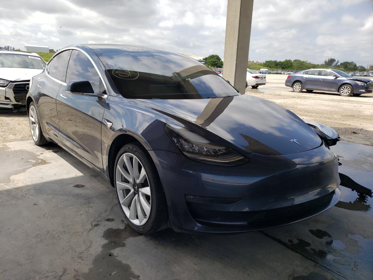 TESLA MODEL 3 2020 with VIN 5YJ3E1EB1LF720380 - Photo from auction