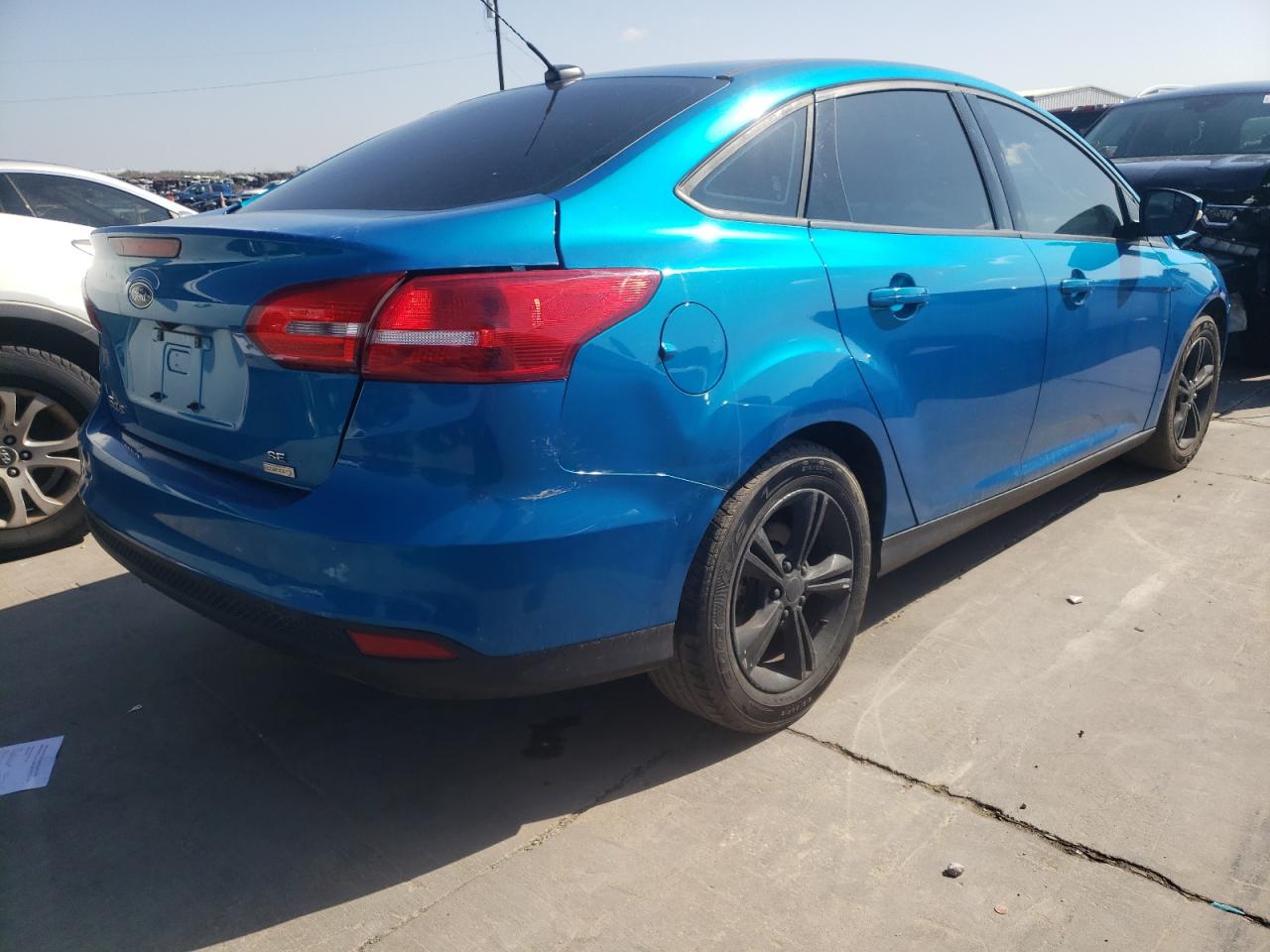 Photo 4 from auction – 2016 FORD FOCUS SE with VIN 1FADP3FE7GL257835