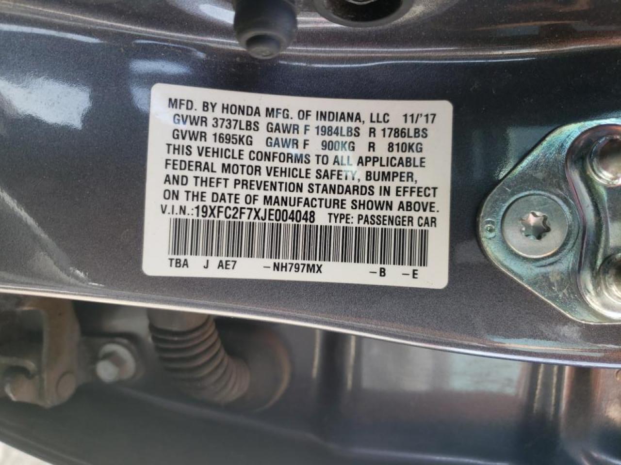 Photo 10 from auction – 2018 HONDA CIVIC EX with VIN 19XFC2F7XJE004048