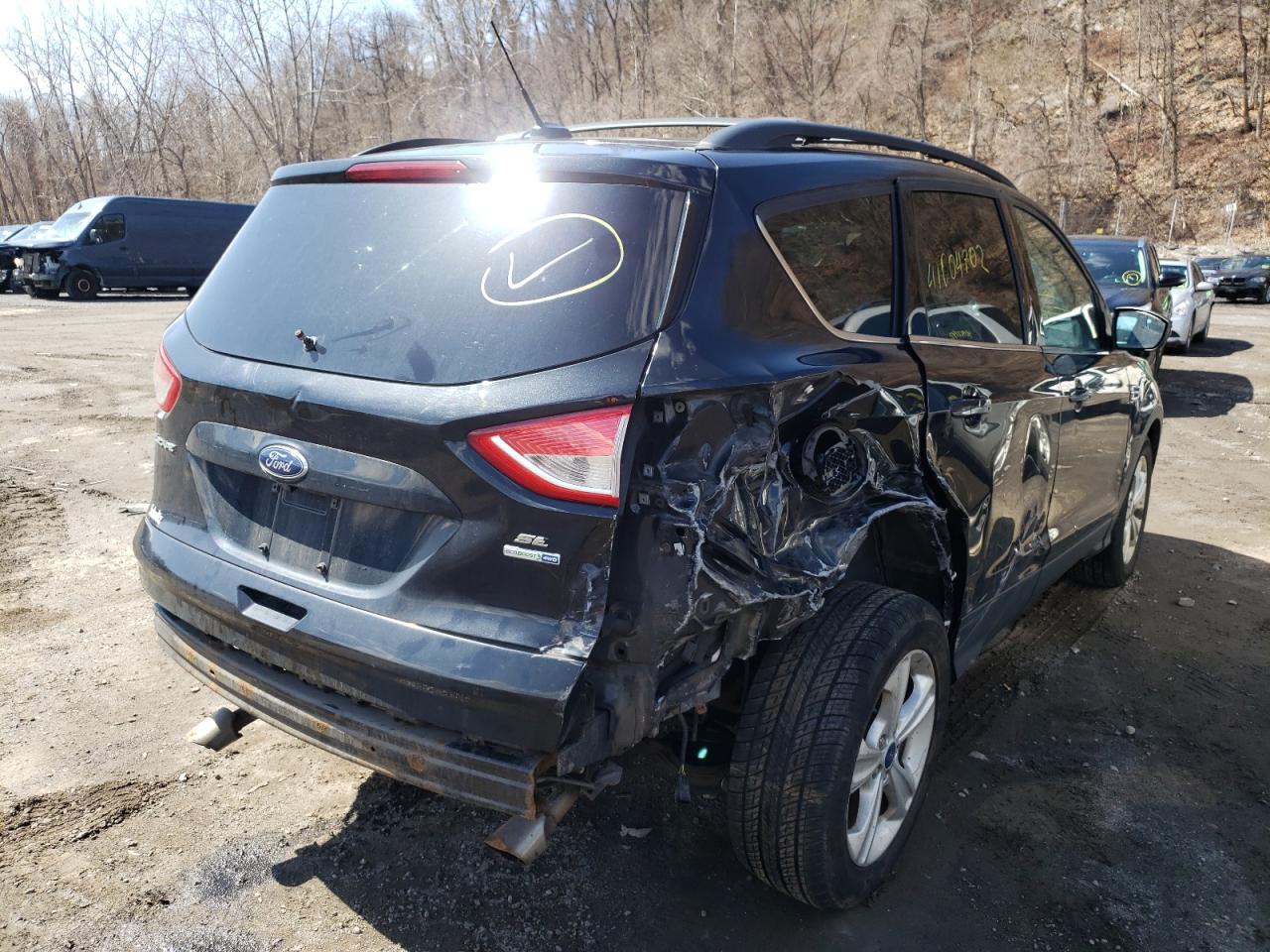 Photo 4 from auction – 2014 FORD ESCAPE SE with VIN 1FMCU9GXXEUB37354