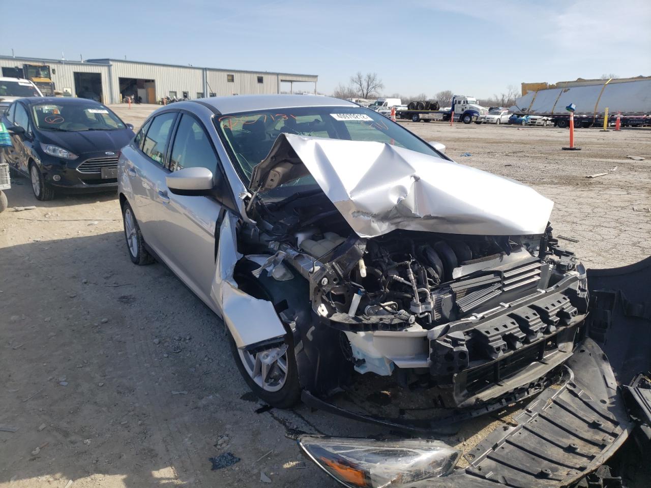 FORD FOCUS SE 2018 with VIN 1FADP3F20JL207131 - Photo from auction