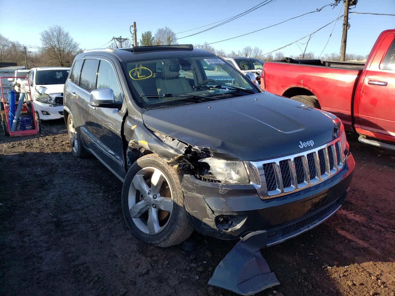 JEEP GRAND CHER 2011 with VIN 1J4RR6GT3BC607344 - Photo from auction