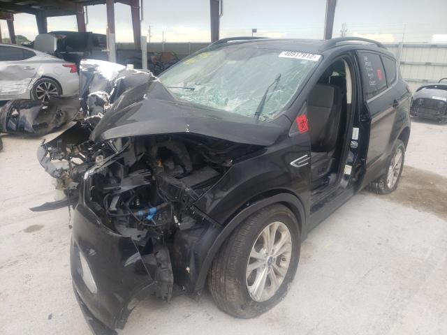 Photo 2 from auction – 2018 FORD ESCAPE SE with VIN 1FMCU0GD4JUA92519