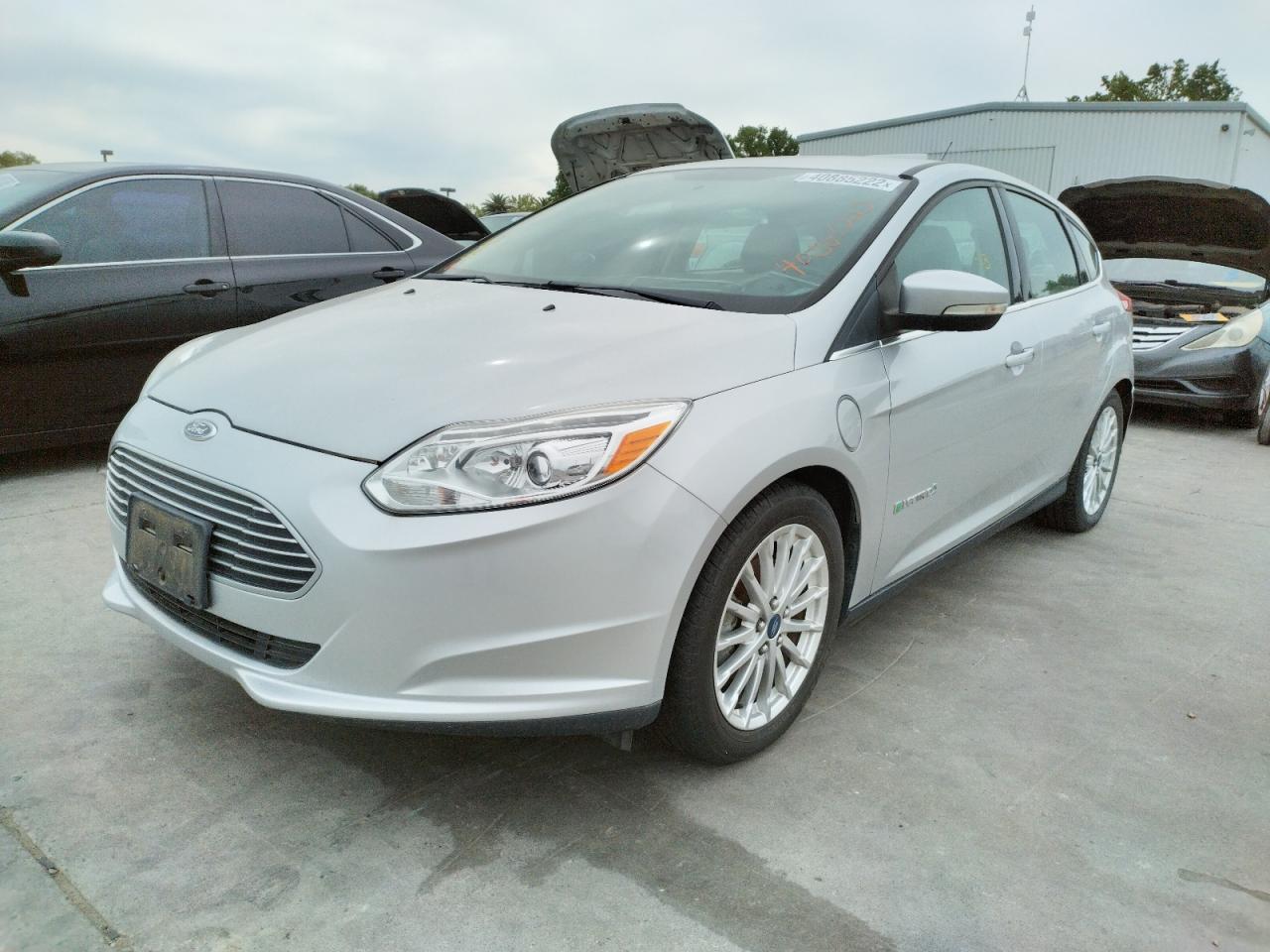 Photo 2 from auction – 2013 FORD FOCUS BEV with VIN 1FADP3R4XDL288091