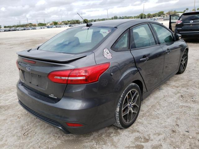 Photo 4 from auction – 2015 FORD FOCUS SE with VIN 1FADP3F24FL384000