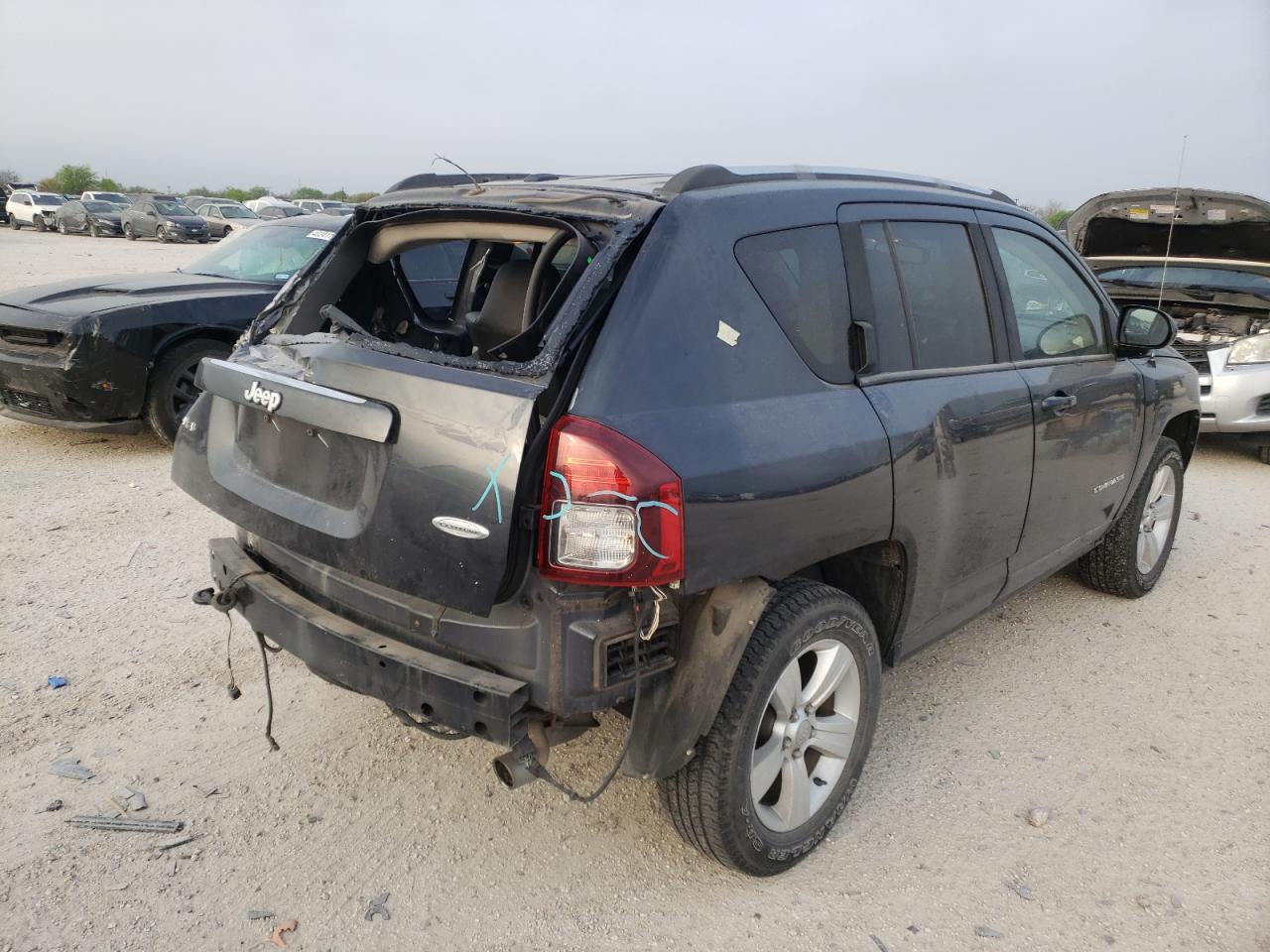 Photo 4 from auction – 2014 JEEP COMPASS LA with VIN 1C4NJDEB1ED720072