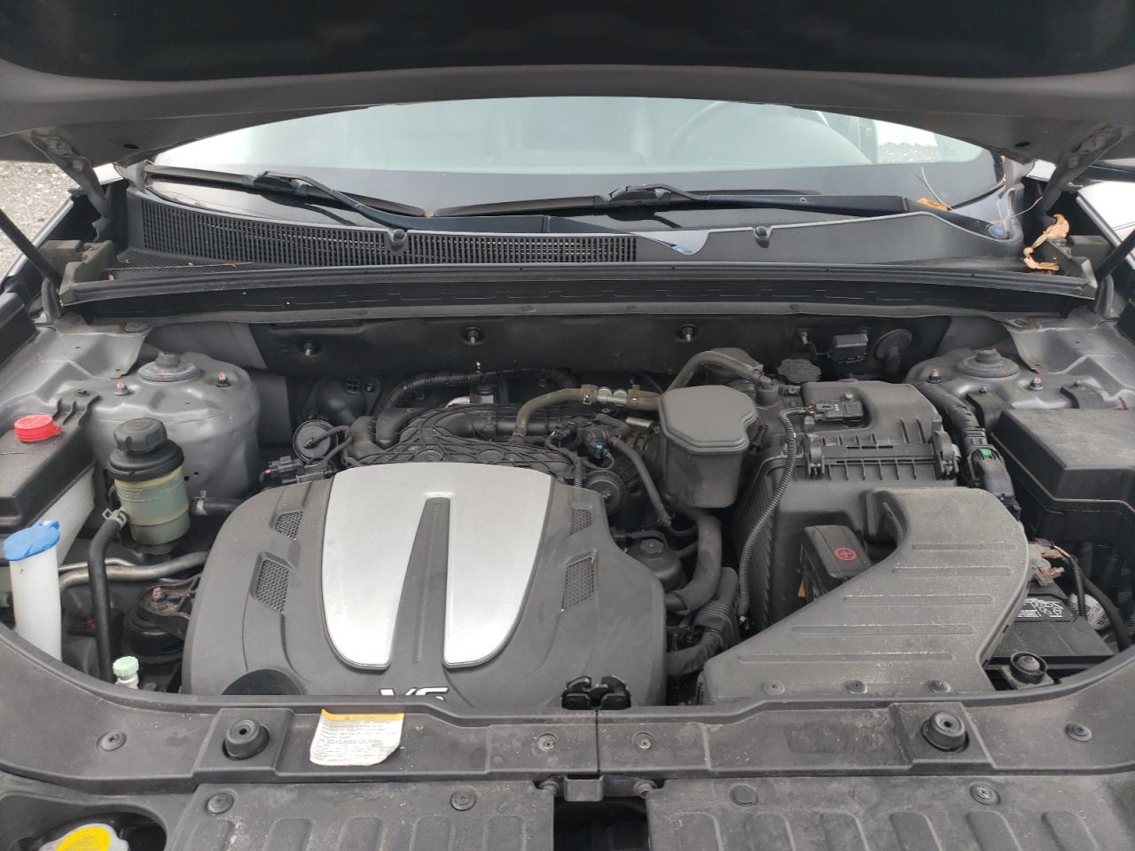 Photo 7 from auction – 2012 KIA SORENTO SX with VIN 5XYKW4A29CG254609