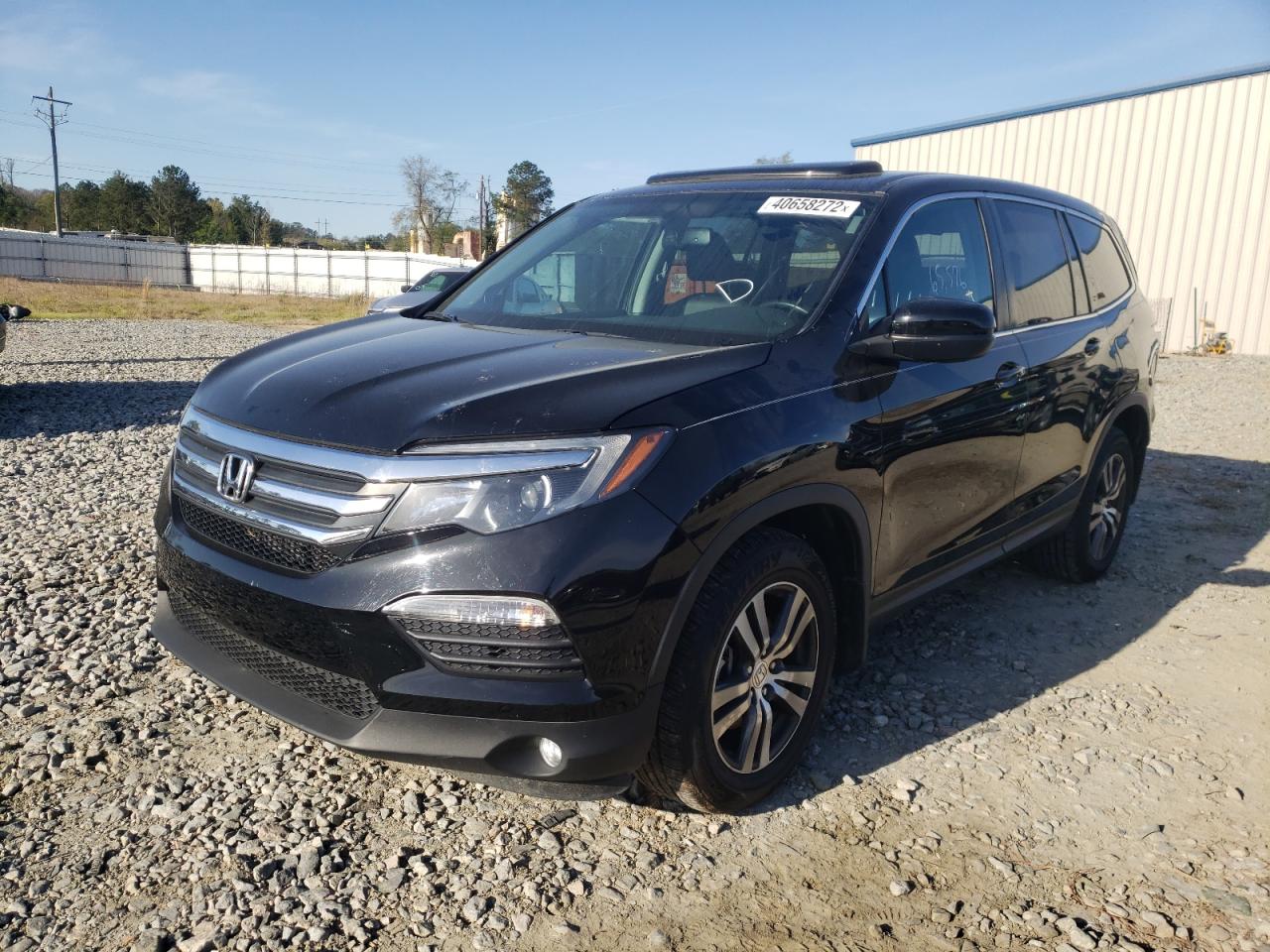 Photo 2 from auction – 2018 HONDA PILOT EXL with VIN 5FNYF5H57JB009084