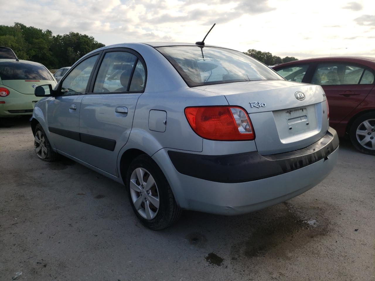 Photo 3 from auction – 2009 KIA RIO BASE with VIN KNADE223396447533