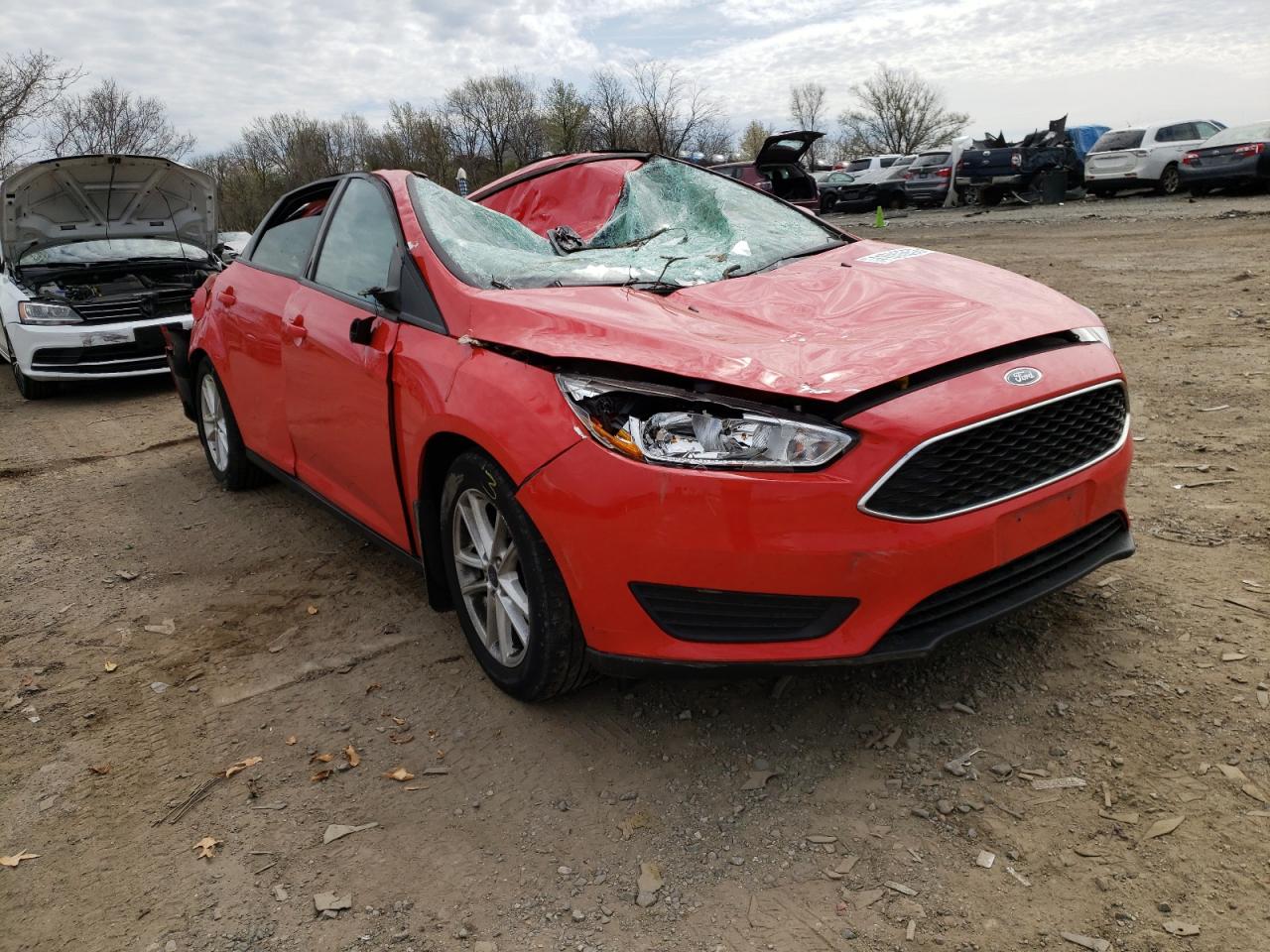 FORD FOCUS SE 2016 with VIN 1FADP3F2XGL296974 - Photo from auction