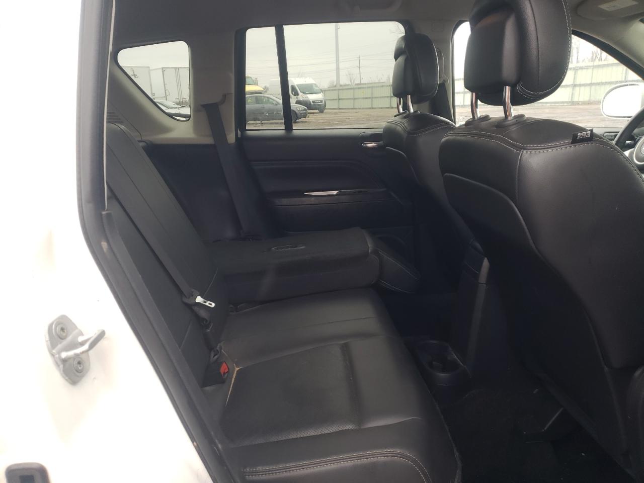 Photo 6 from auction – 2014 JEEP COMPASS LI with VIN 1C4NJDCB7ED620223