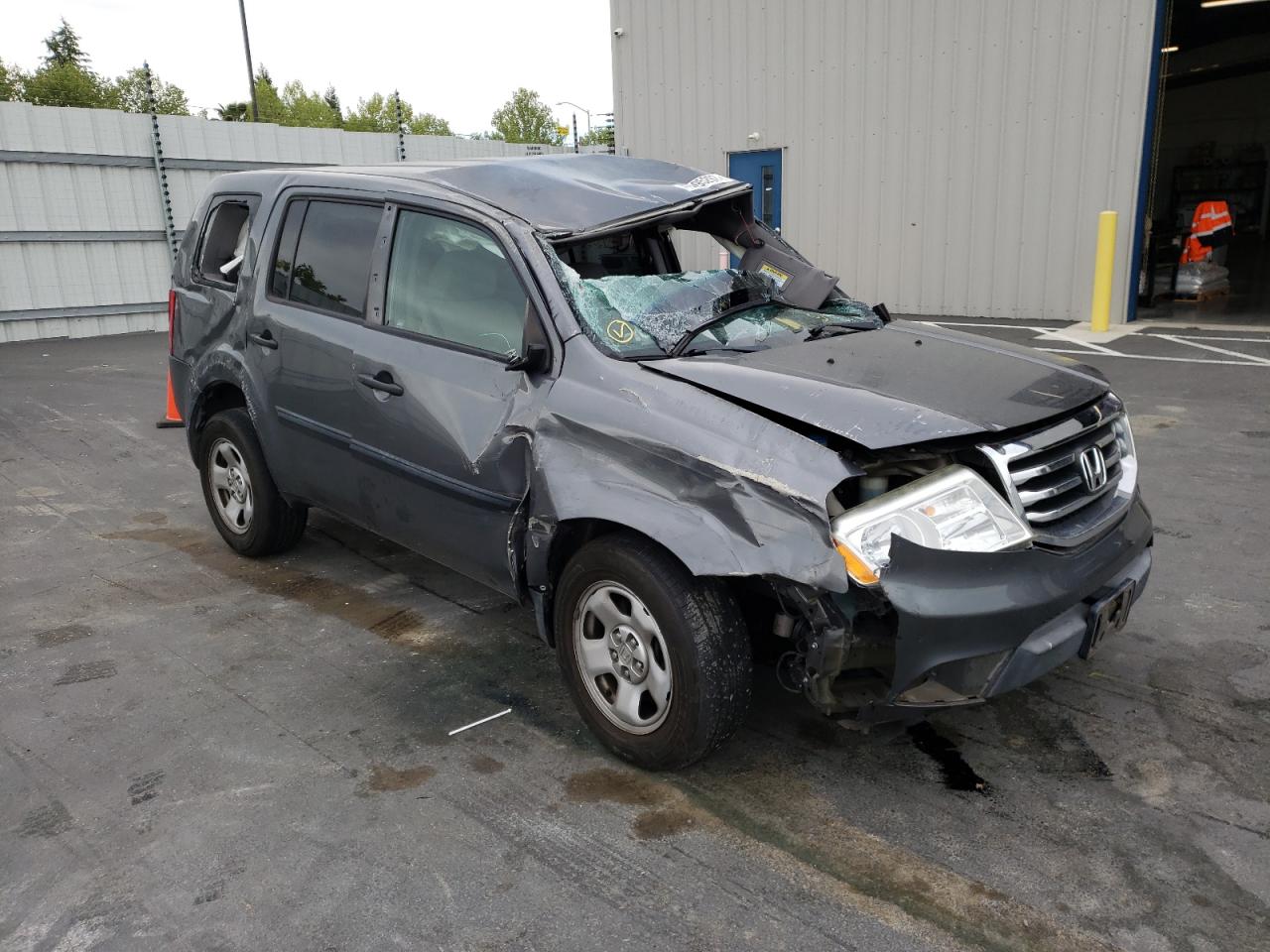 HONDA PILOT LX 2012 with VIN 5FNYF3H24CB021044 - Photo from auction