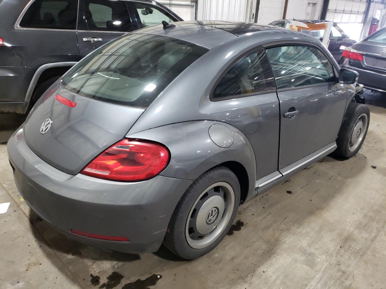 Photo 4 from auction – 2012 VOLKSWAGEN BEETLE with VIN 3VWJP7AT2CM627394