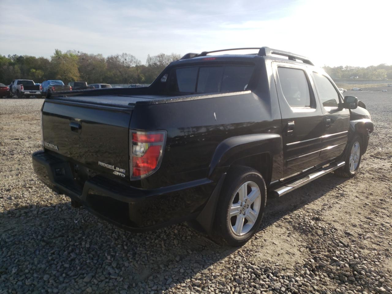 Photo 4 from auction – 2014 HONDA RIDGELINE with VIN 5FPYK1F51EB002314
