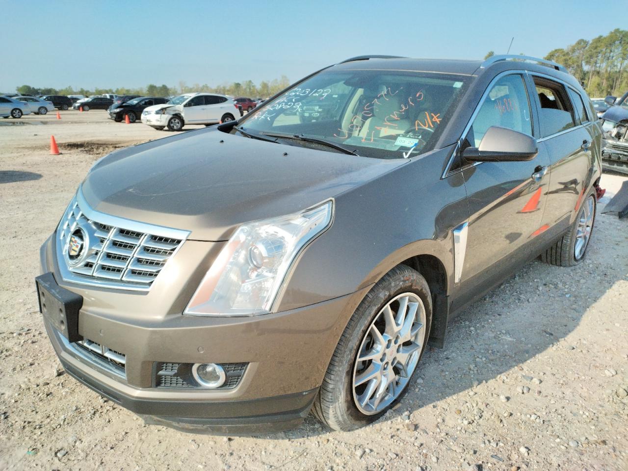 Photo 2 from auction – 2015 CADILLAC SRX PREMIU with VIN 3GYFNDE36FS527252