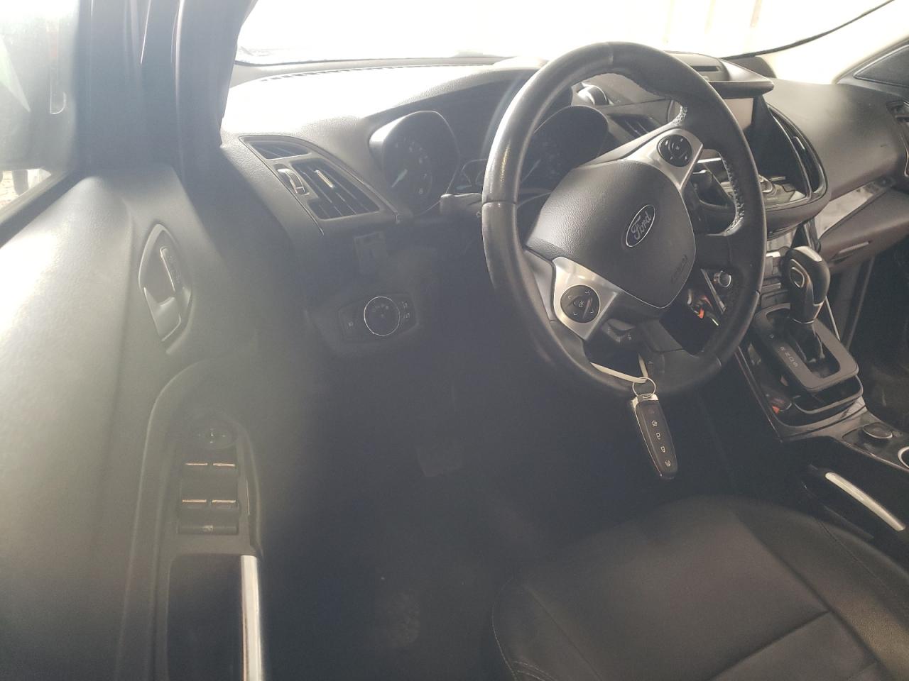 Photo 9 from auction – 2014 FORD ESCAPE TIT with VIN 1FMCU0J96EUD52574
