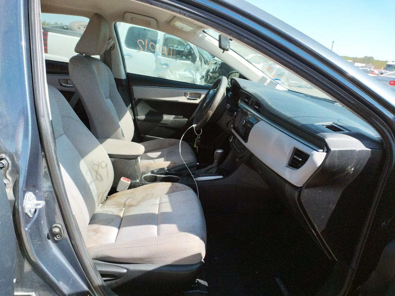 Photo 5 from auction – 2016 TOYOTA COROLLA L with VIN 5YFBURHE7GP372212