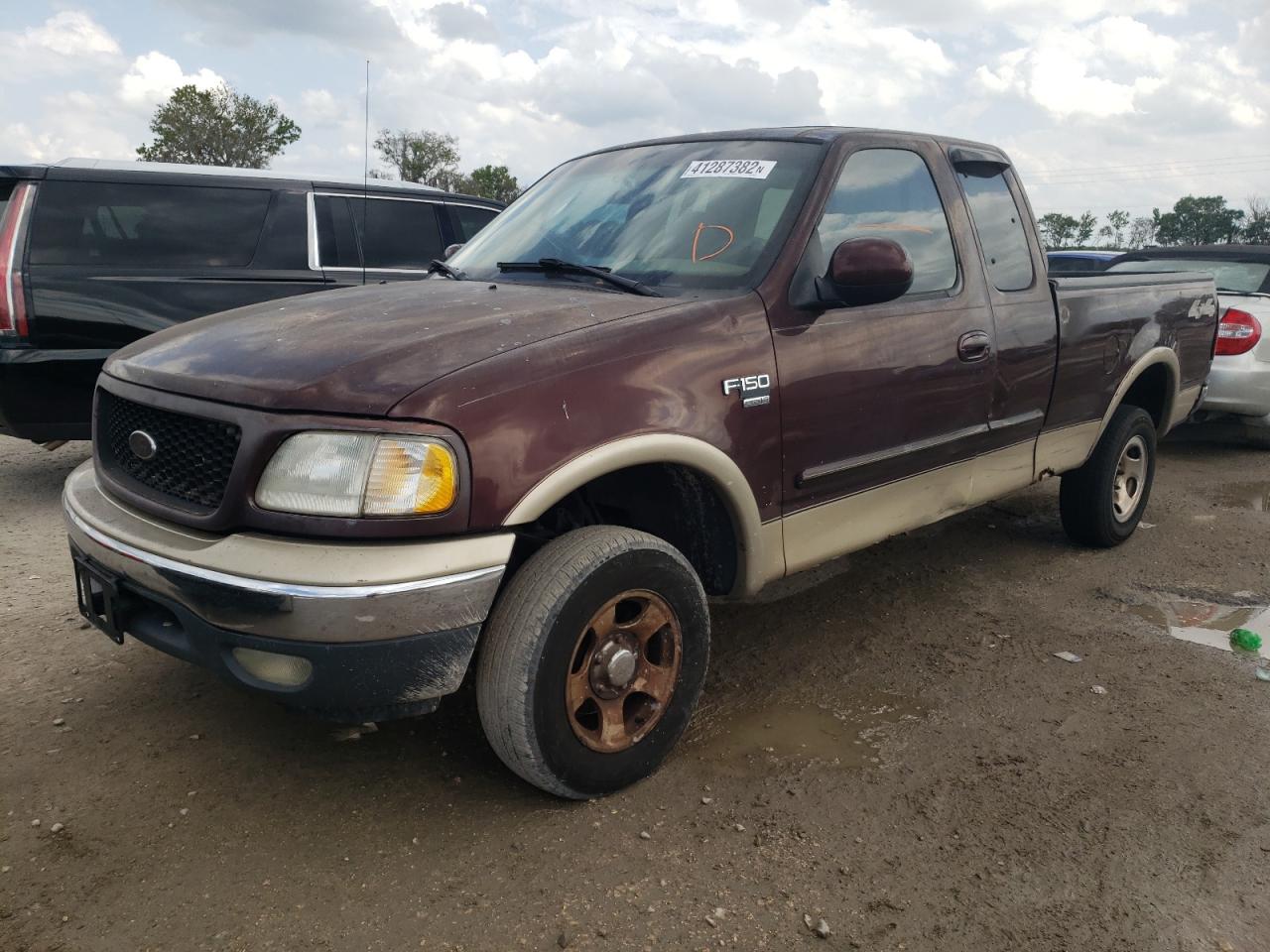 Photo 2 from auction – 2000 FORD F150 with VIN 1FTRX18L8YNB00451