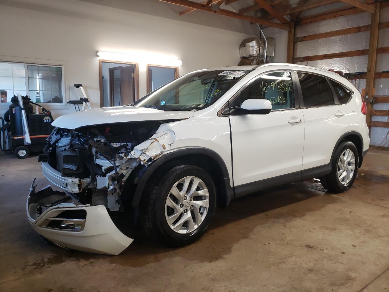Photo 2 from auction – 2015 HONDA CR-V EXL with VIN 5J6RM4H7XFL115128