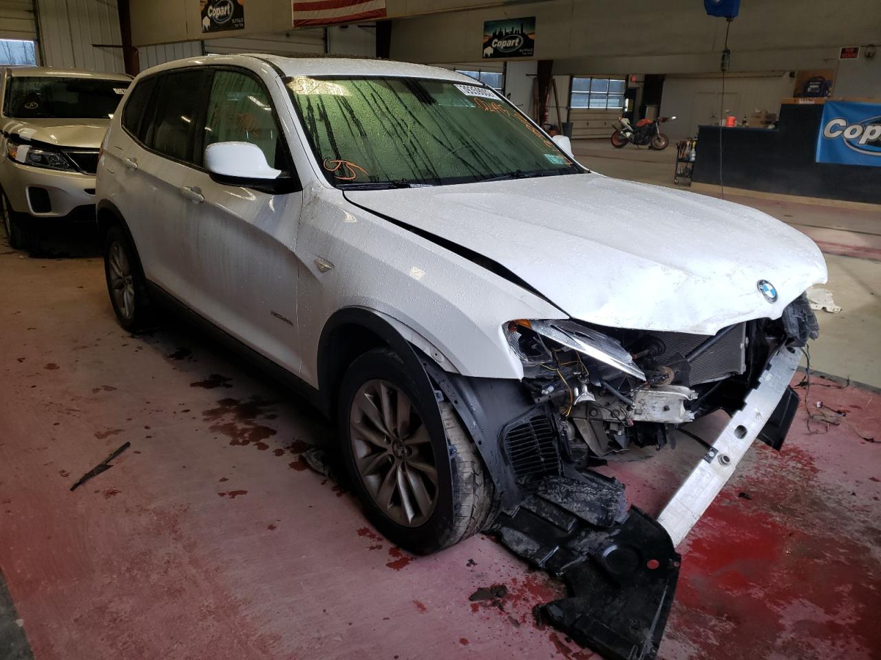 BMW X3 2014 with VIN 5UXWX9C51E0D24925 - Photo from auction