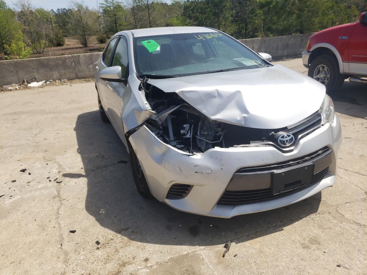 TOYOTA COROLLA L 2016 with VIN 5YFBURHE0GP495138 - Photo from auction