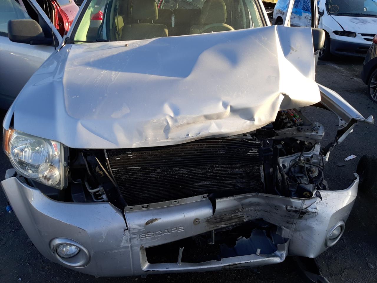 Photo 7 from auction – 2009 FORD ESCAPE XLT with VIN 1FMCU93G39KB77637