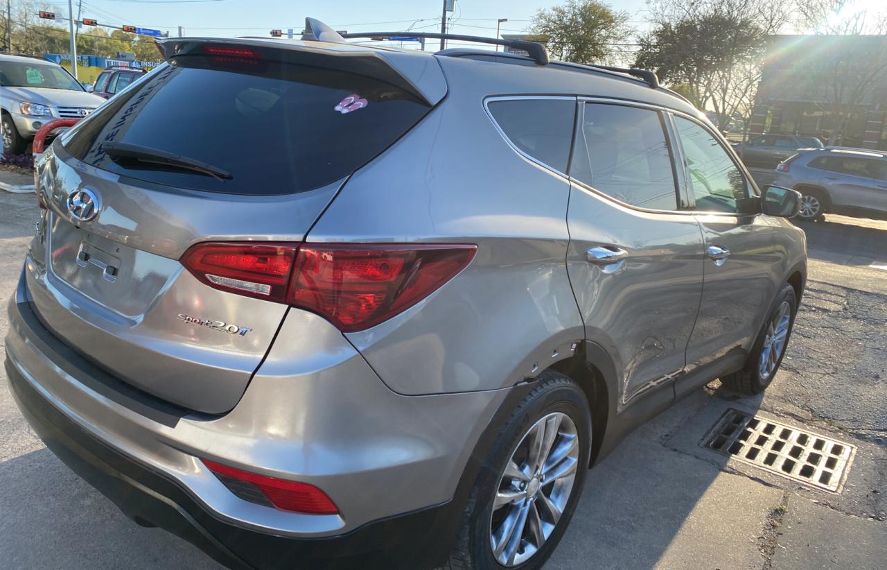 Photo 4 from auction – 2018 HYUNDAI SANTA FE S with VIN 5NMZU4LA9JH074381