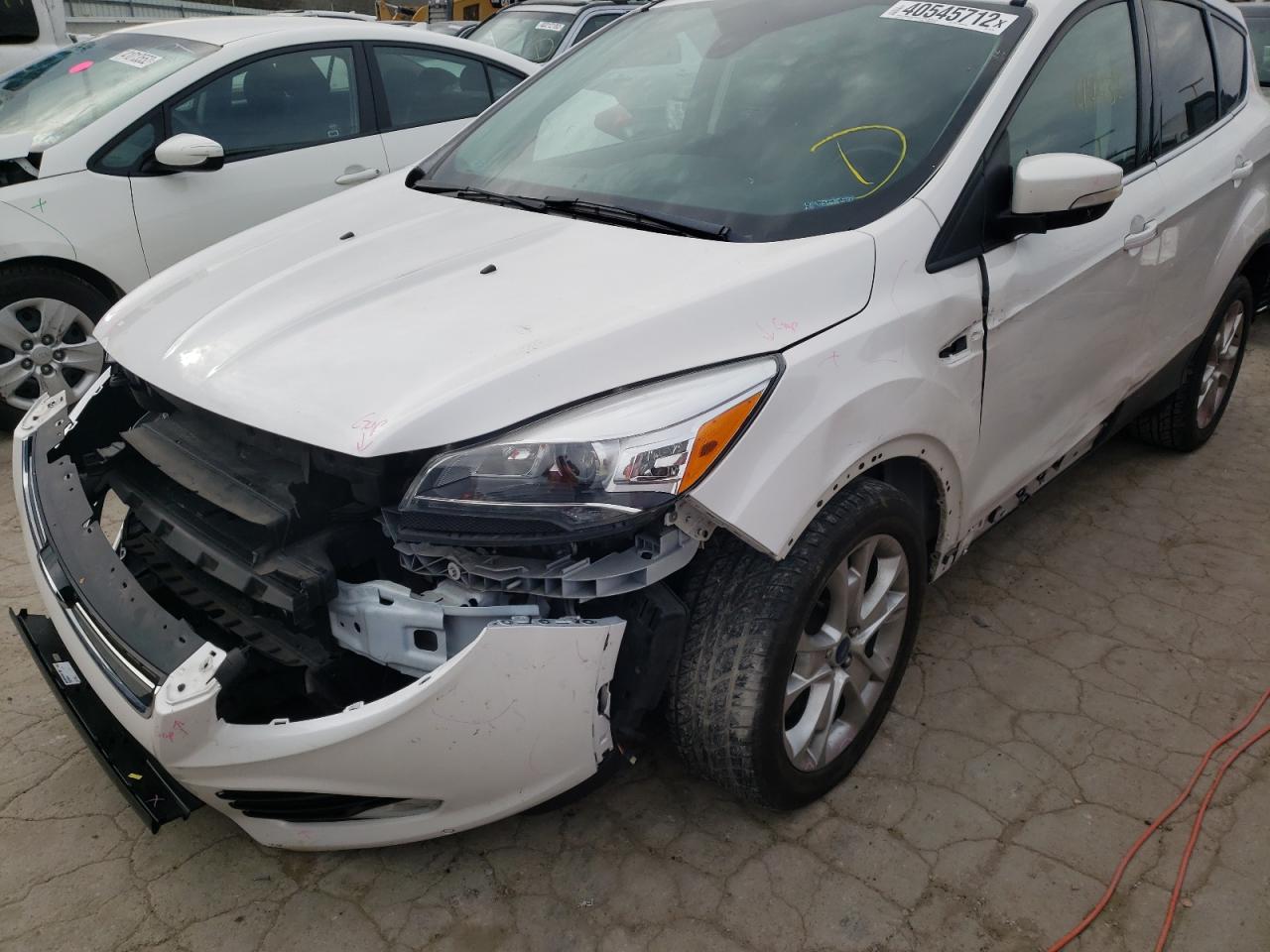 Photo 9 from auction – 2016 FORD ESCAPE TIT with VIN 1FMCU0J91GUC55768
