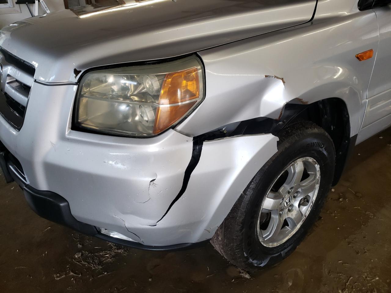 Photo 9 from auction – 2006 HONDA PILOT EX with VIN 5FNYF28606B003951