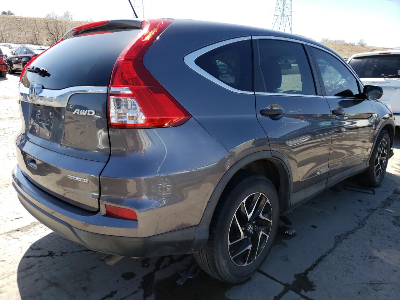 Photo 4 from auction – 2016 HONDA CR-V SE with VIN 2HKRM4H49GH689799