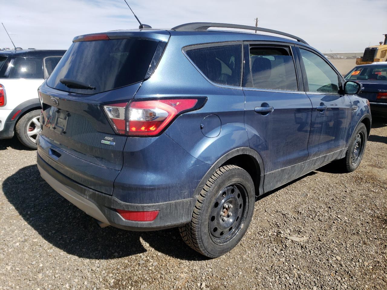 Photo 4 from auction – 2018 FORD ESCAPE SE with VIN 1FMCU9GDXJUC52262