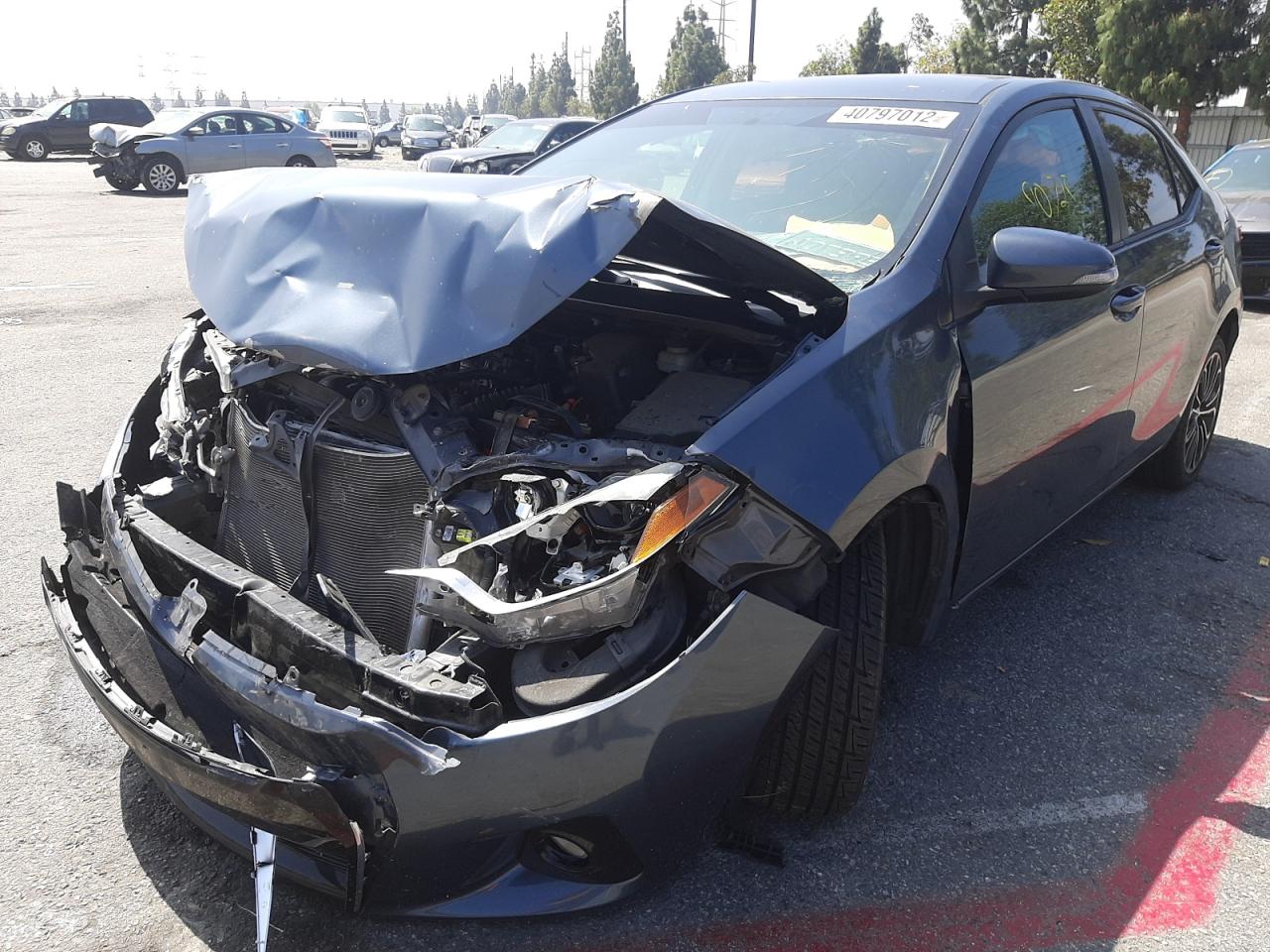Photo 2 from auction – 2014 TOYOTA COROLLA L with VIN 5YFBURHEXEP079062