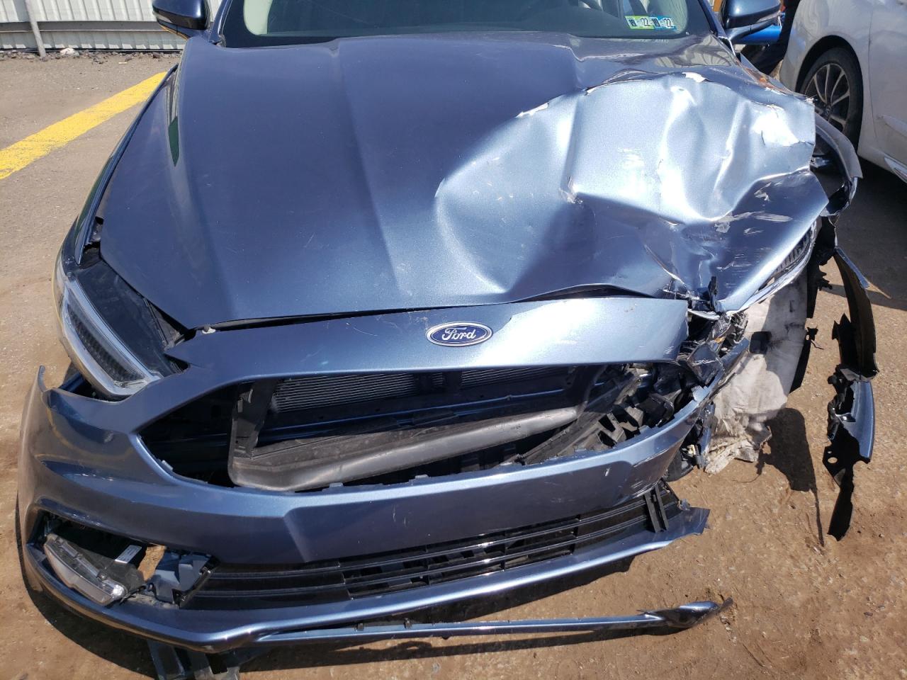Photo 7 from auction – 2018 FORD FUSION TIT with VIN 3FA6P0RUXJR219969